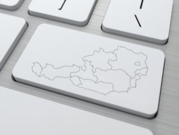 ABK-Bausoftware aus Österreich Tastatur auf der eine Landkarte Österreichs auf einem Tab aufgezeichnet ist